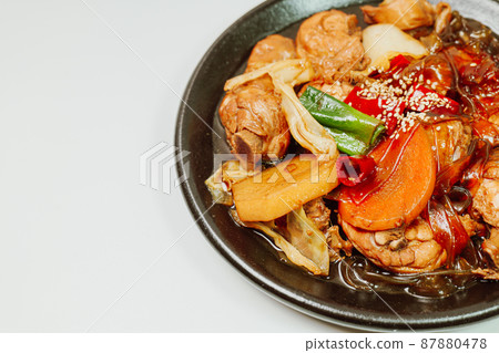 Korean food Andong steamed chicken dish on a black plate Korean food Andong steamed chicken dish on a black plate 87880478