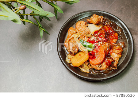 Korean food Andong steamed chicken dish on a black plate Korean food Andong steamed chicken dish on a black plate 87880520