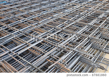 steel rod or rebar with some rust bonded with steel wire for use as a construction infrastructure, steel beams at the factory steel rod or rebar with some rust bonded with steel wire for use as a construction infrastructure, steel beams at the factory 87881860
