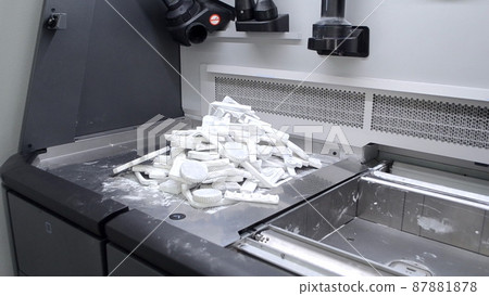 Objects and models printed on industrial 3D printer from white plastic powder Objects and models printed on industrial 3D printer from white plastic powder 87881878