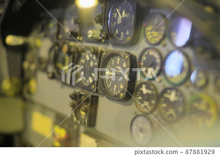 Shallow focus on Aircraft Cockpit Instruments, Control panel in old plane cockpit. Shallow focus on Aircraft Cockpit Instruments, Control panel in old plane cockpit. 87881929