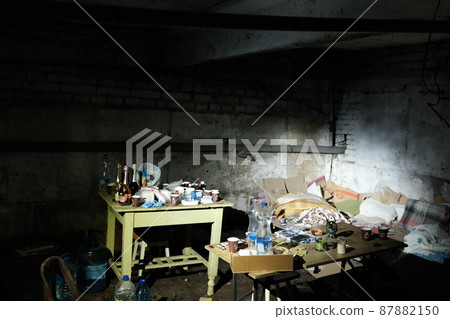Mariupol, Ukraine - 05.03.2022. War in Ukraine, a bomb shelter, people in the basement 87882150