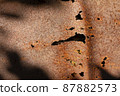 Rust on a metal part of industrial equipment obtained due to corrosion from sea water. 87882573
