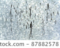 Silver background in the form of a sheet of galvanized textured steel with black drops of resin. 87882578