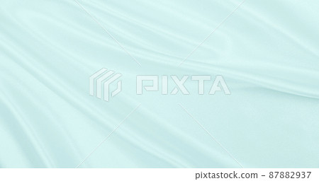 Smooth elegant blue silk or satin luxury cloth texture as abstract background. Luxurious background design Smooth elegant blue silk or satin luxury cloth texture as abstract background. Luxurious background design 87882937