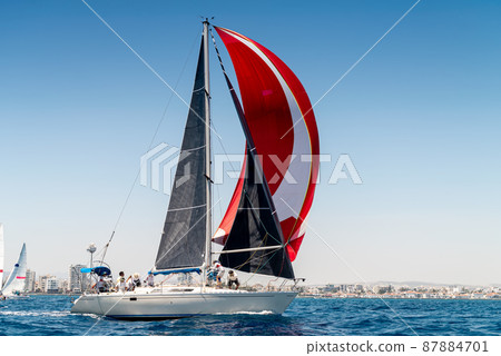 Sailboats racing during regatta off the coast of Larnaca. Cyprus Sailboats racing during regatta off the coast of Larnaca. Cyprus 87884701