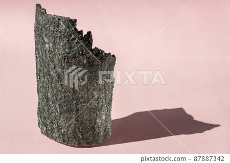 Pink background for cosmetic product presentation with shadows from sun. Backdrop with bark tree, display, mockup for product photography Pink background for cosmetic product presentation with shadows from sun. Backdrop with bark tree, display, mockup for product photography 87887342