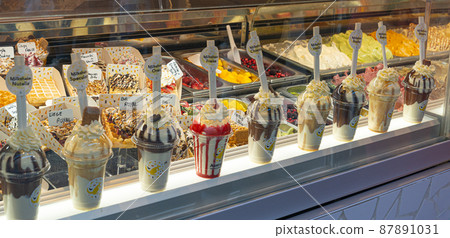 Belgian waffles with colorful toppings on showcase. Brussels Belgian waffles with colorful toppings on showcase. Brussels 87891031