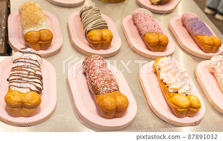 Belgian penis shape waffles with toppings on showcase. Brussels Belgian penis shape waffles with toppings on showcase. Brussels 87891032