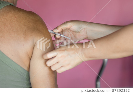 vacinating old man for prevent covid19 vacinating old man for prevent covid19 87892332