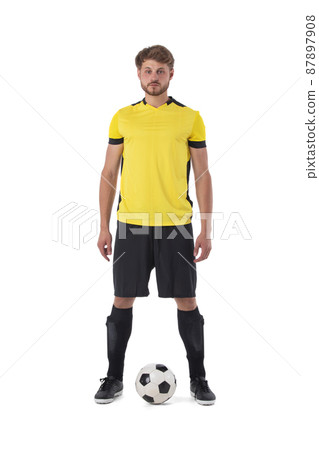 Soccer player with ball on white 87897908
