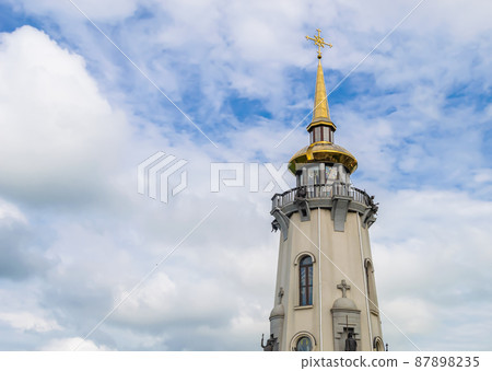 Christian church cross in high steeple tower for prayer 87898235