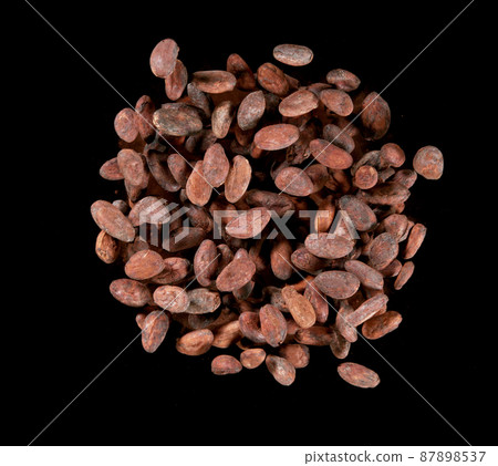 Cocoa beans flying in the air in freeze motion. 87898537