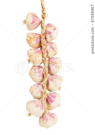 Artificial garlic is intertwined like a braid. 87898967