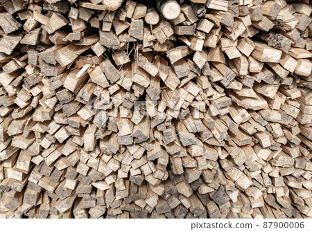 Photography on theme big wall of stacked oak tree logs in cracks Photography on theme big wall of stacked oak tree logs in cracks 87900006