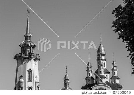Christian church cross in high steeple tower for prayer Christian church cross in high steeple tower for prayer 87900049