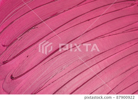 Texture of red, scarlet, smudged lipstick. Cosmetic background Texture of red, scarlet, smudged lipstick. Cosmetic background 87900922