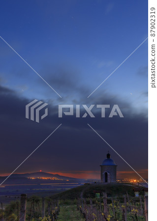 Chapel near Velke Bilovice with Palava during sunset, Southern Moravia, Czech Republic 87902319