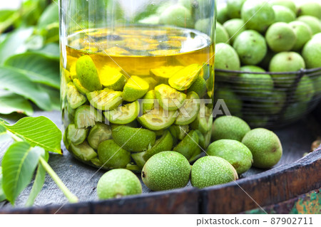still life of walnut liqueur 87902711