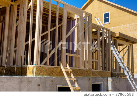 New home construction framing of a house New home construction framing of a house 87903598