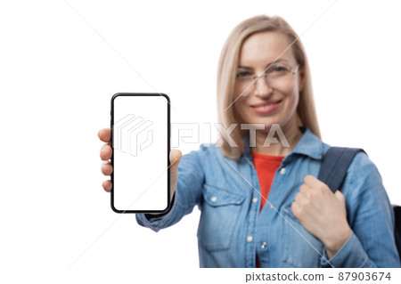 Woman holding white screen mobile 87903674