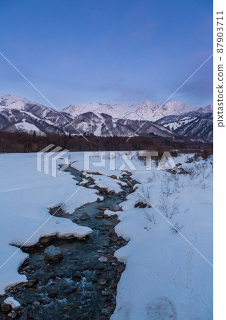 Snow scene in the Northern Alps at dawn from Hakuba Bridge Snow scene in the Northern Alps at dawn from Hakuba Bridge 87903711