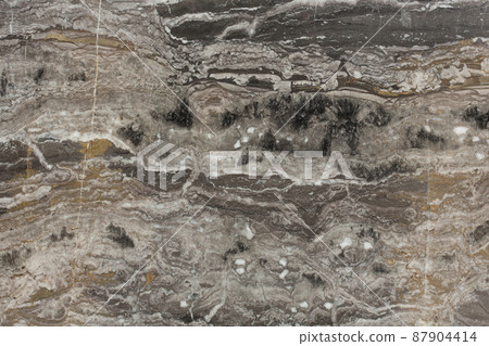 Granire, black stone wall surface. Granire, black stone wall surface. 87904414