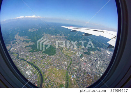 Kagoshima sky seen from an airplane with feathers 87904437