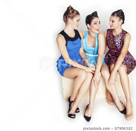 group of diverse stylish ladies in bright dresses isolated on white smiling having fun, watching selfie, lifestyle people concept 87906382