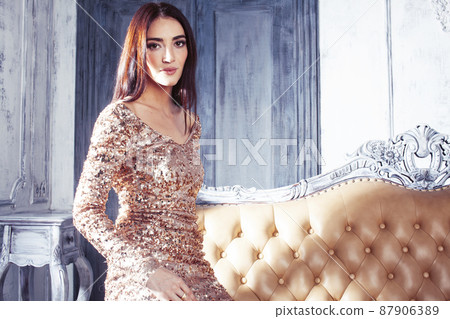 young pretty brunette woman posing in luxury hotel room interior, lifestyle rich people concept young pretty brunette woman posing in luxury hotel room interior, lifestyle rich people concept 87906389