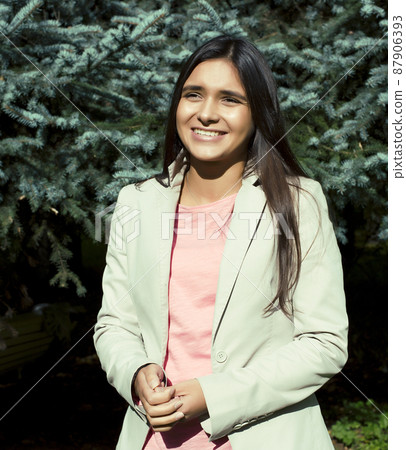 Young cute smiling real stylish dressed woman in green palm park smiling, resting, enjoing, lifestyle outside concept Young cute smiling real stylish dressed woman in green palm park smiling, resting, enjoing, lifestyle outside concept 87906393