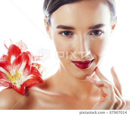 young pretty brunette real woman with red flower amaryllis isolated on white background young pretty brunette real woman with red flower amaryllis isolated on white background 87907014