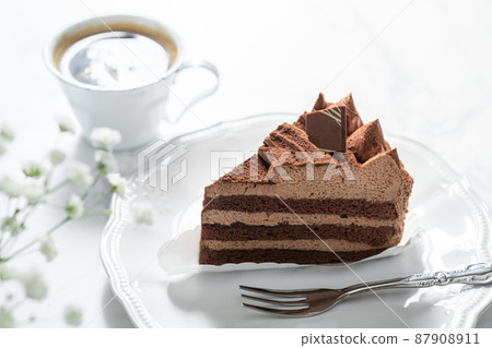 Chocolate cake and coffee white background material Chocolate cake and coffee white background material 87908911