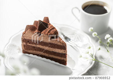 Chocolate cake and coffee white background material 87908912