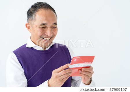 Senior men happy to see passbooks Senior men happy to see passbooks 87909197