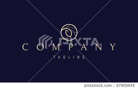 Vector golden logo on which an abstract image of a large leaf in a circle with tree branches. Vector golden logo on which an abstract image of a large leaf in a circle with tree branches. 87909848