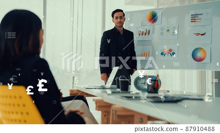 Business people in corporate staff meeting with envisional graphic Business people in corporate staff meeting with envisional graphic 87910488