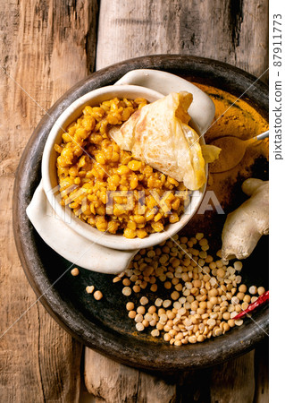 Traditional indian yellow pea food dal with roti bread Traditional indian yellow pea food dal with roti bread 87911773
