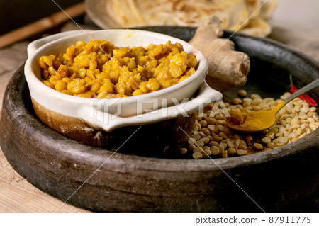 Traditional indian yellow pea food dal with roti bread Traditional indian yellow pea food dal with roti bread 87911775