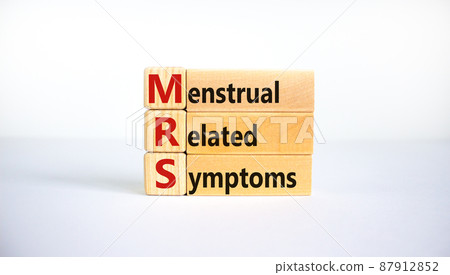 Medical and MRS, menstrual related symptoms symbol. Wooden blocks with the word 'MRS, menstrual related symptoms'. Beautiful white background. Copy space. Medical, MRS concept. 87912852