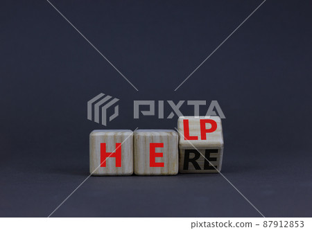 Help is here support symbol. Turned a wooden cube with concept word Help to Here. Beautiful grey table grey background, copy space. Business support help is here concept. Help is here support symbol. Turned a wooden cube with concept word Help to Here. Beautiful grey table grey background, copy space. Business support help is here concept. 87912853