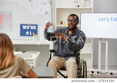 Science Teacher using Wheelchair in Class 87914194