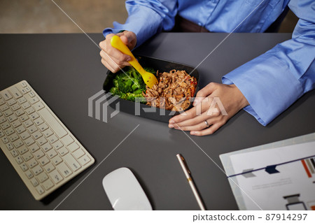 Late Dinner at Work Top View 87914297