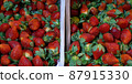 Fresh strawberries on the store counter 87915330