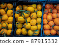 Fresh tangerines on the counter 87915332