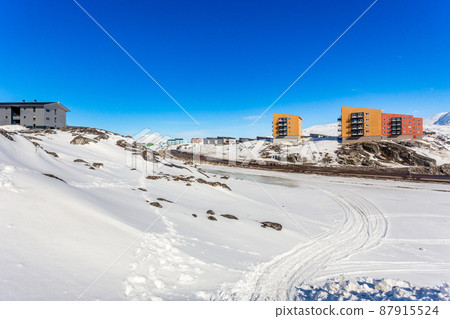 Greenlandic landscape with Inuit multistory houses of Nuuk city on the rocks, Greenland Greenlandic landscape with Inuit multistory houses of Nuuk city on the rocks, Greenland 87915524
