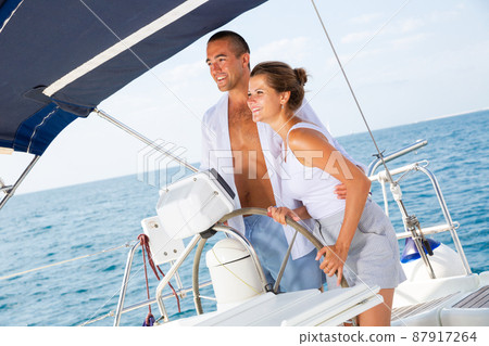 Couple steering yacht 87917264