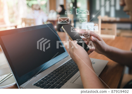 Contact Message and Electronic Mailbox Concept, Businesswoman Received Email While Using Smartphone and Laptop Computer With Icons Virtual Screen. Digital Contact Mail for Business Communication Contact Message and Electronic Mailbox Concept, Businesswoman Received Email While Using Smartphone and Laptop Computer With Icons Virtual Screen. Digital Contact Mail for Business Communication 87919402