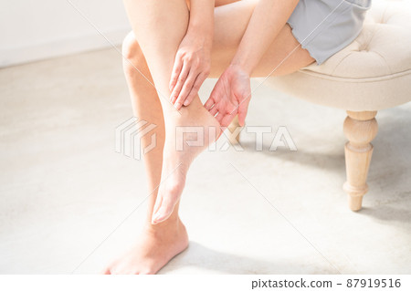 Beauty image of a woman doing a self-massage 87919516