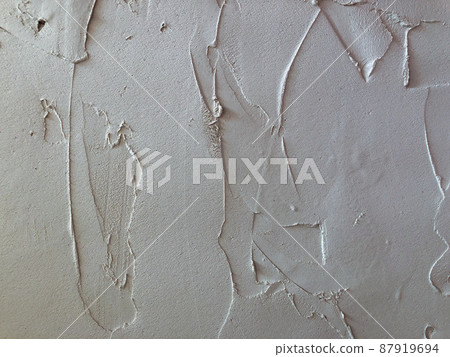 Textured plaster. White wall stucco texture. Plastered background Textured plaster. White wall stucco texture. Plastered background 87919694